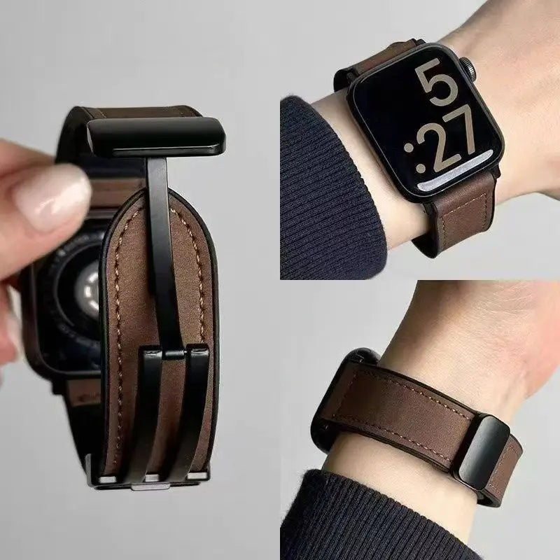 Brown leather watch strap with black metal clasp, shown on a wrist and in a holder.