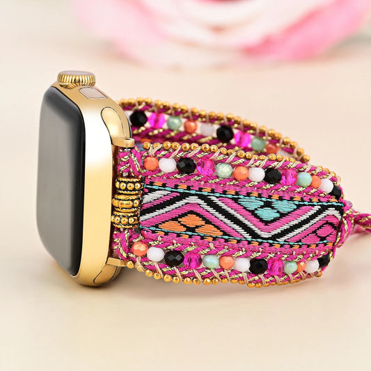 Smartwatch with a colorful beaded band on a light background