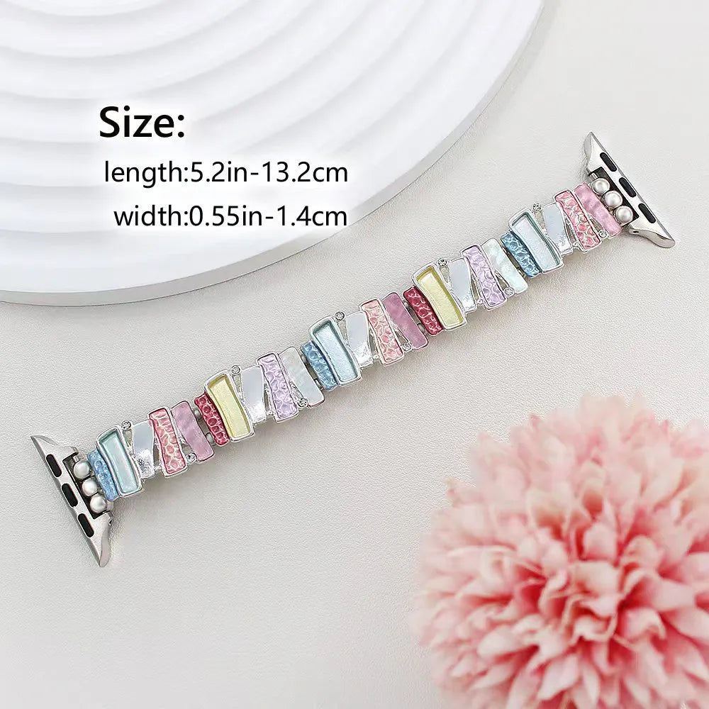 Multicolored watch band with size specifications on a light background