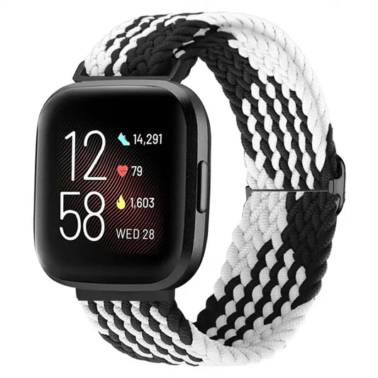 Smartwatch with a black and white braided band on a white background