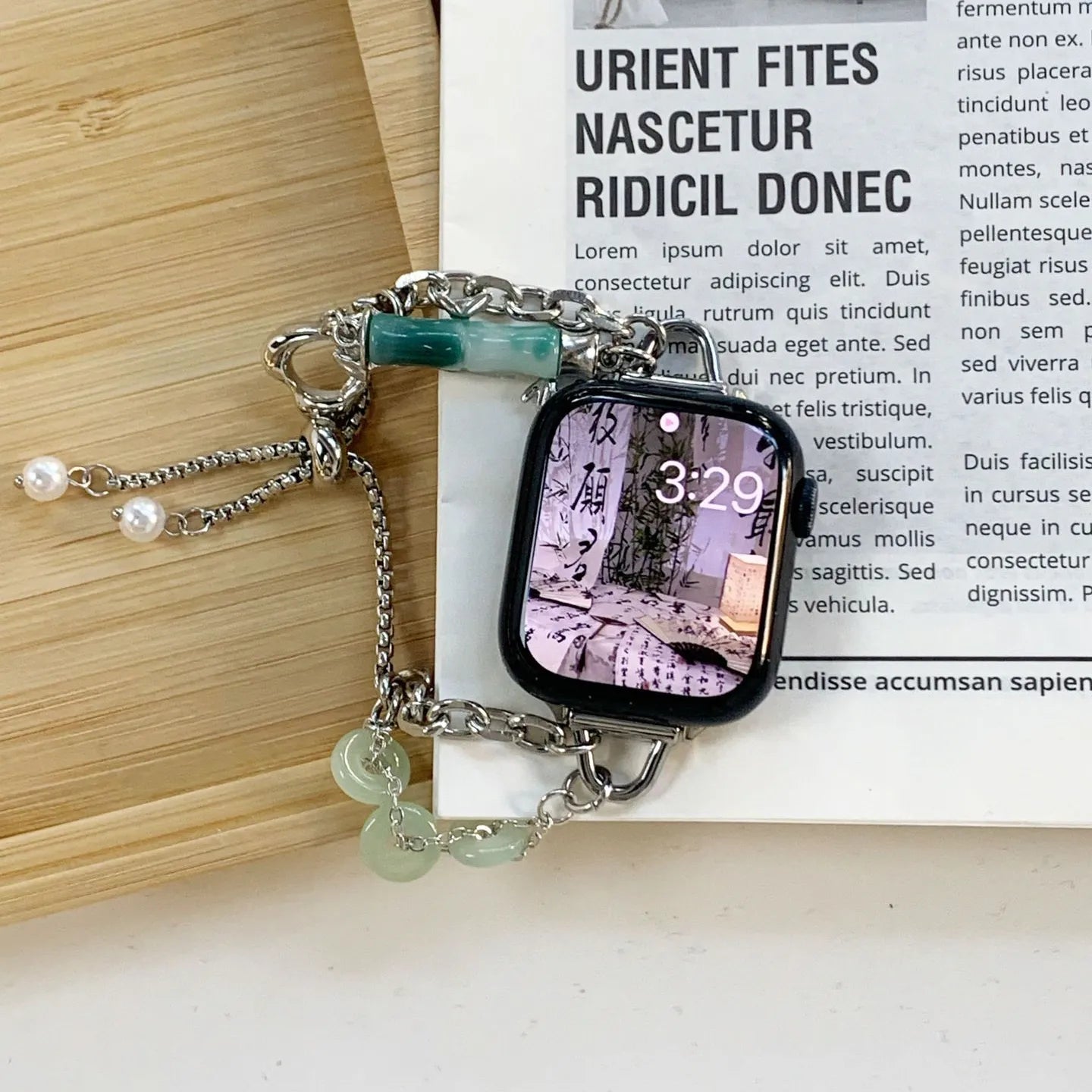 Smartwatch with decorative band on a wooden surface with text in the background