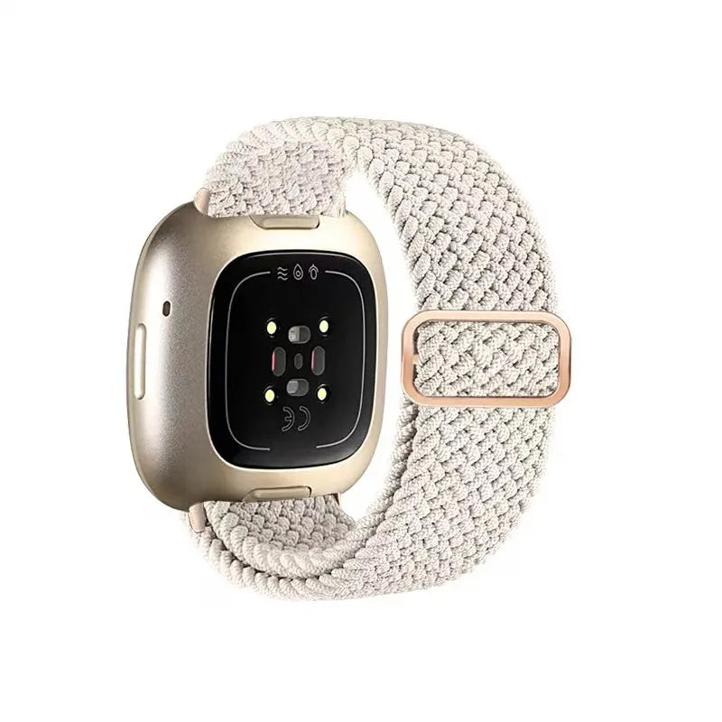 Smartwatch with a textured beige band on a white background