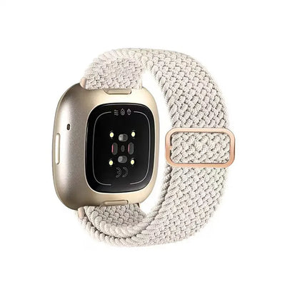 Smartwatch with a textured beige band on a white background