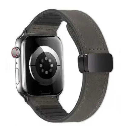 Smartwatch with a gray leather strap on a white background