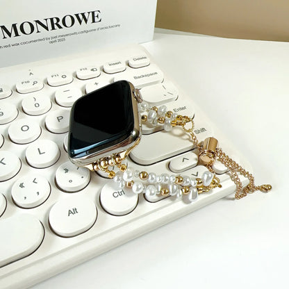 Black phone case with gold and pearl accents on a keyboard, featuring the brand 'Monrowe'.