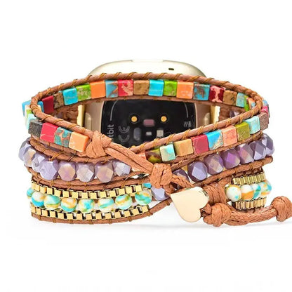 Multicolored beaded bracelet with a smartwatch on a white background
