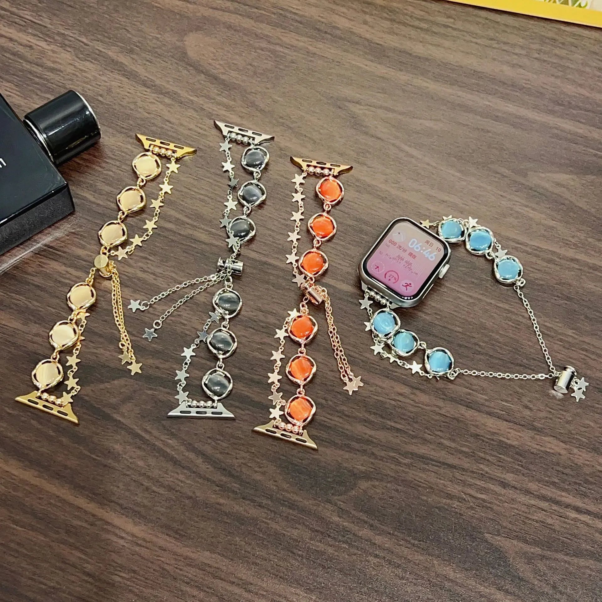 Smartwatch with decorative band on a wooden surface