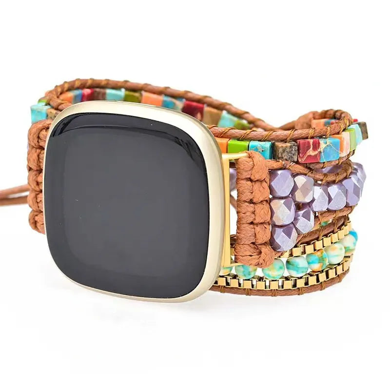 Multicolored beaded watch band on a white background