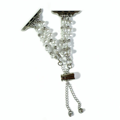 Pearl bracelet with metal clasp on a white background