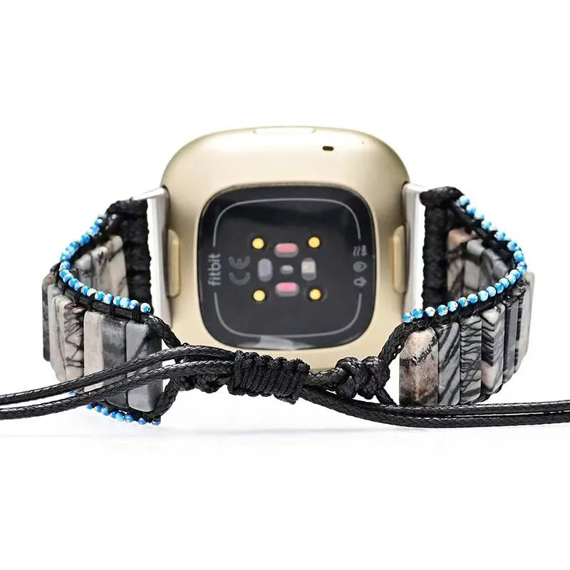 Smartwatch with a camouflage band on a white background