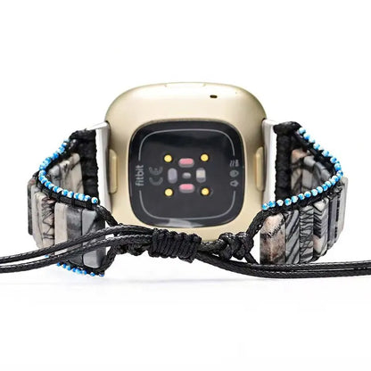 Smartwatch with a camouflage band on a white background