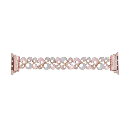 Watch band with rose gold and multicolored design on a white background