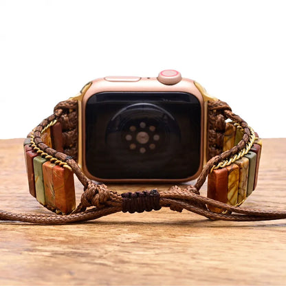 Smartwatch with a braided wooden strap on a wooden surface