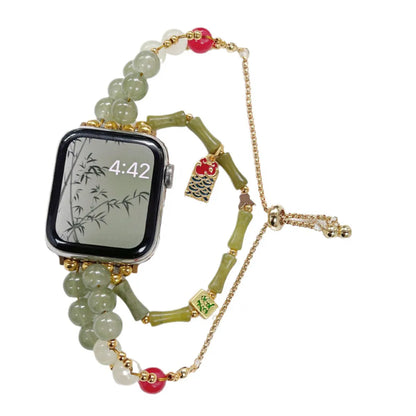 Smartwatch with a decorative beaded strap on a white background