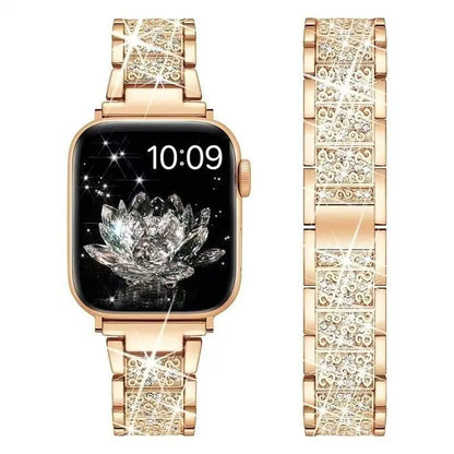 Smartwatch with a rose gold band featuring gemstones on a white background