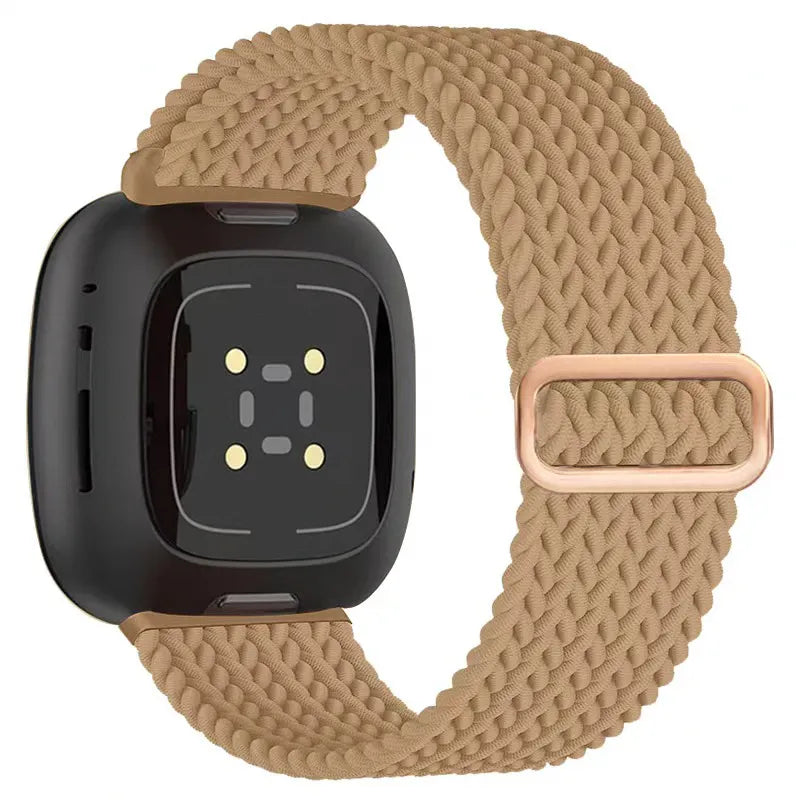 Smartwatch with a beige braided band on a white background